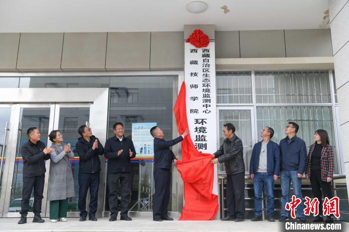 图为签约仪式现场。贡嘎来松 摄 article_img