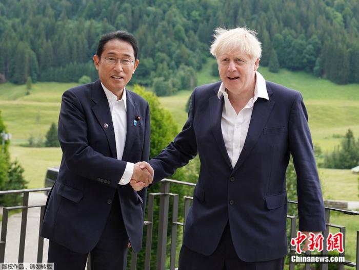 当地时间6月28日,英国首相约翰逊和日本首相岸田文雄在德国会面。 article_img